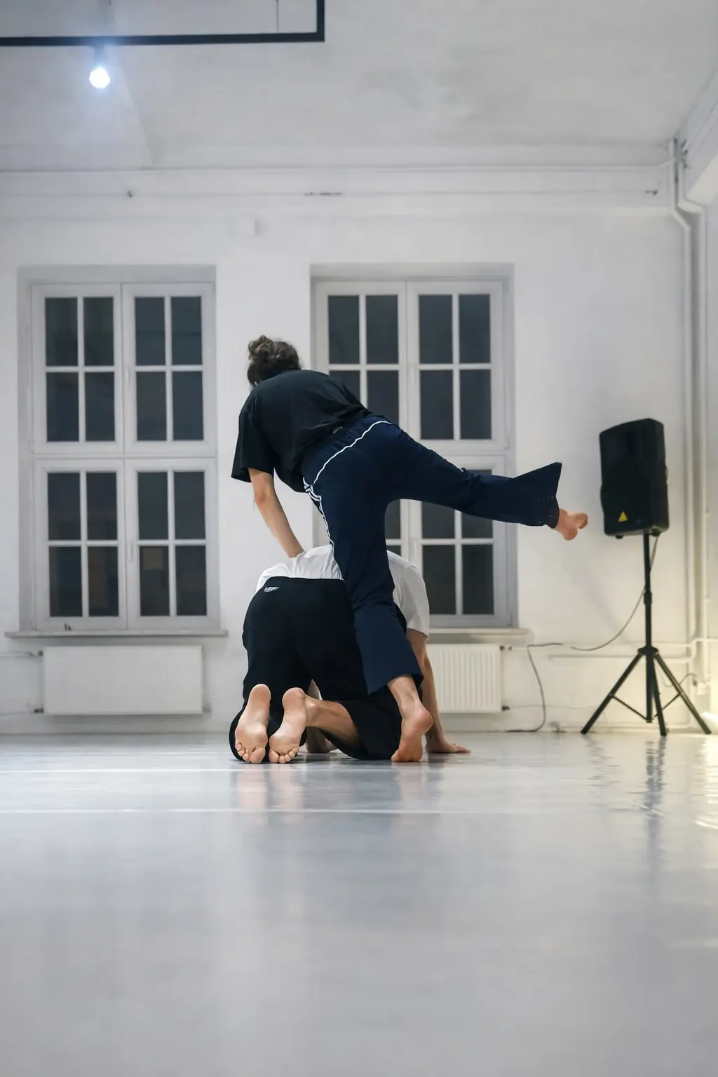 Partner dancers in close, attentive contact
